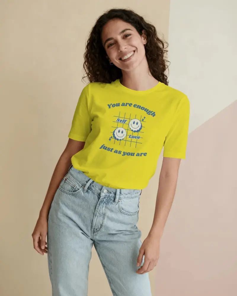 Casual Tilted T Shirt Mockup Female Model Smiling Soft Pastel Background Clean Look