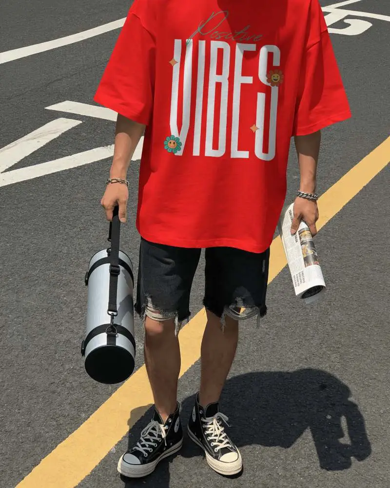 Amazon Tshirt Mockup Male Model Standing On Road Holding Poster Tube And Rolled Paper