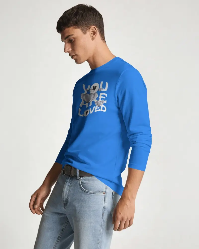 Side Pose T Shirt Mockup With Male Model Light Denim Jeans And Soft Neutral Studio Background