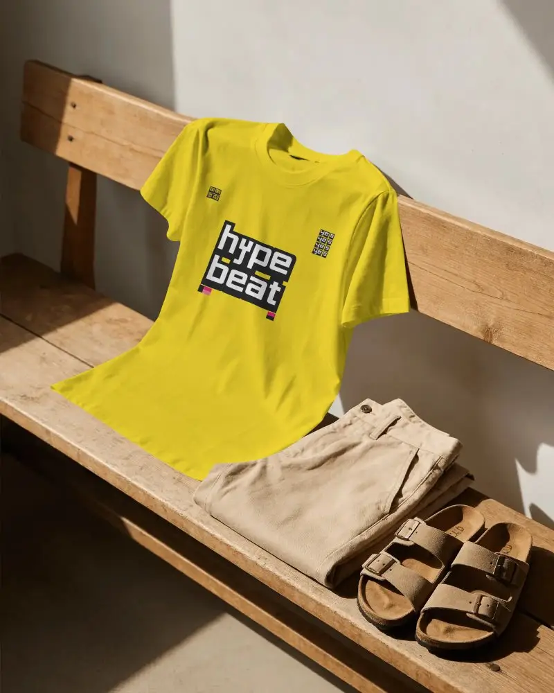 Comfy Casual Tshirt Mockup With Folded Pants And Sandal Style Shoe On Natural Wood Bench