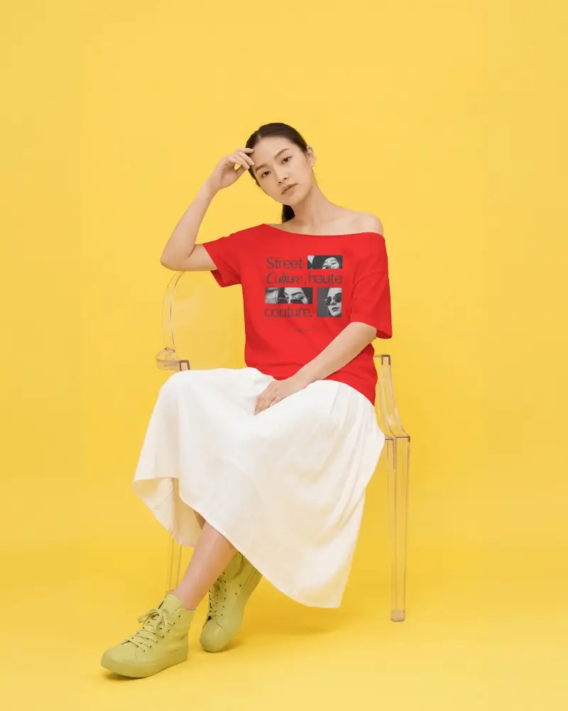 Yellow Studio T Shirt Mockup Female Model Sitting On Transparent Chair With Off Shoulder Fashion