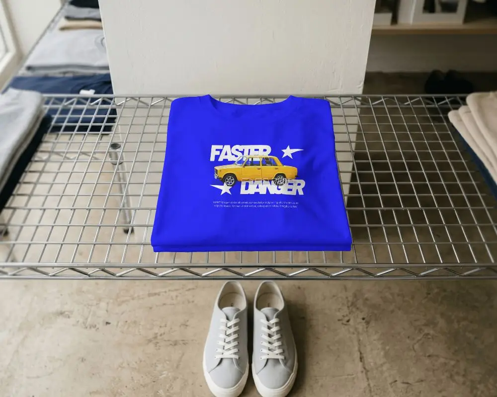 Flat Lay Folded T Shirt Mockup Placed On Wire Shelf With Clean Apparel Retail Studio Scene Styling
