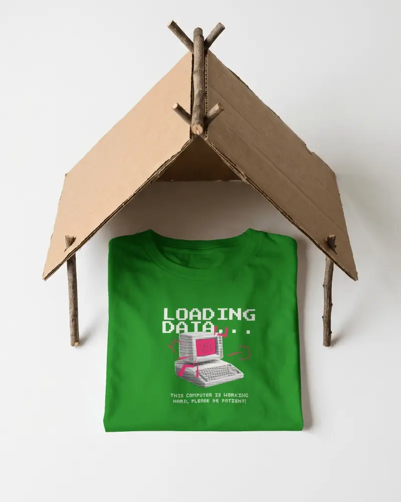 Creative Folded T Shirt Mockup Under Handmade Cardboard Roof With Minimal Studio Background