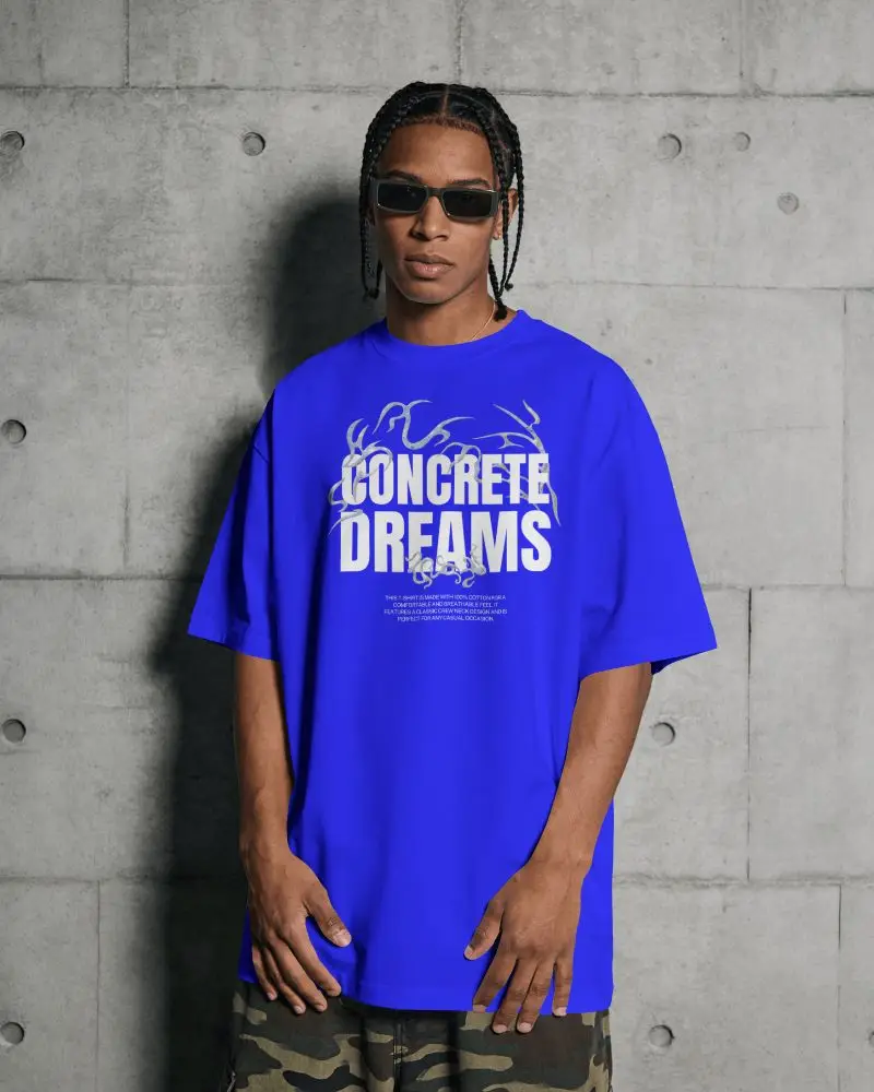 Urban Streetwear T Shirt Mockup Male Model Standing Against Industrial Concrete Background