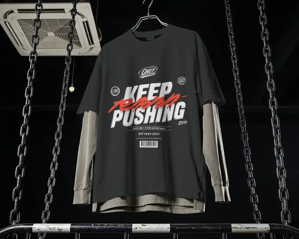 Streetwear T Shirt Mockup With Long Sleeve Underlayer Hanging In Moody Industrial Interior