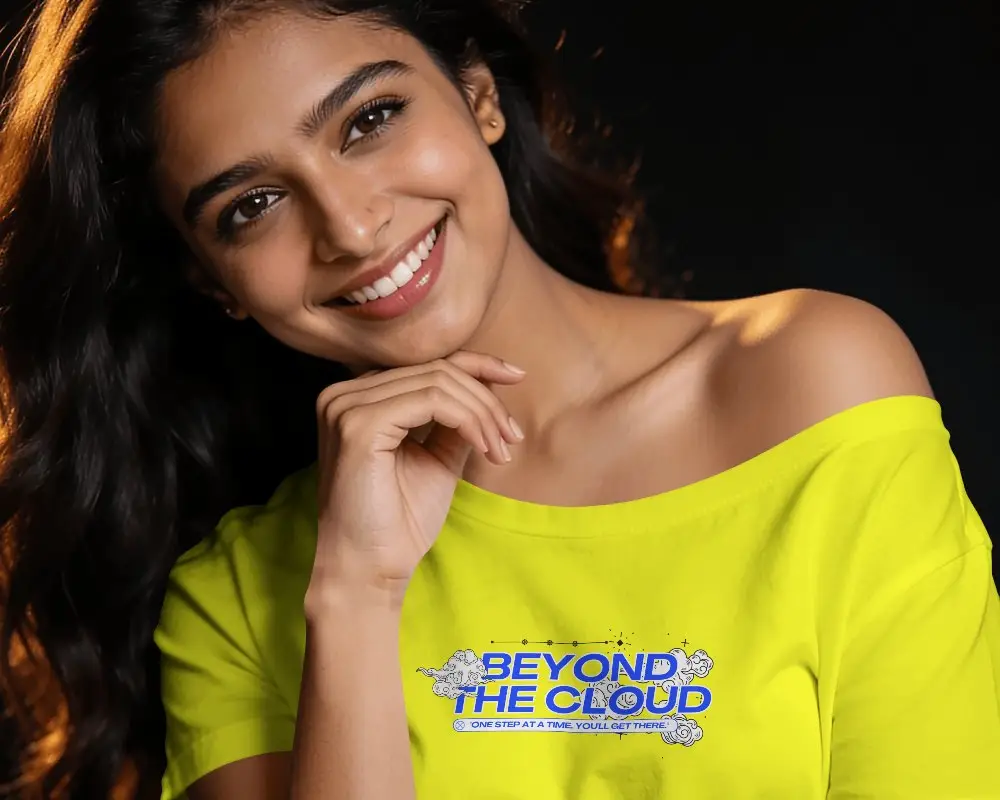 Close Up T Shirt Mockup Female Model Smiling With Hand Under Chin In Dark Studio Lighting