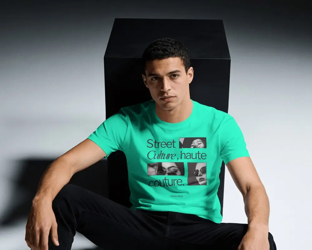 Minimal Studio T Shirt Mockup Male Model Sitting Against Black Cube With Clean Fashion Composition