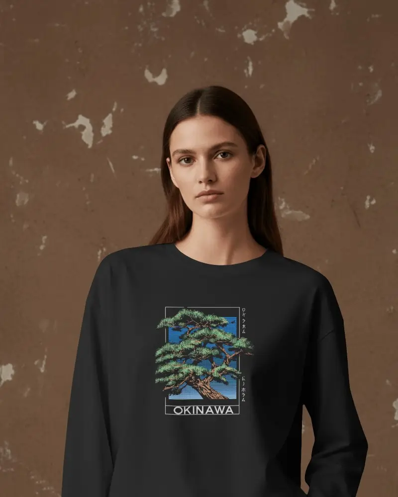 Minimal Studio T Shirt Mockup Female Model Wearing Relaxed Long Sleeve Tee Against Textured Wall