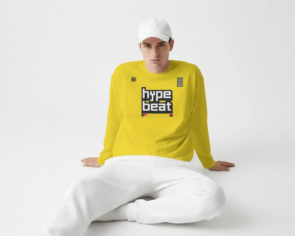 Minimal White Studio T Shirt Mockup Male Model Seated On Floor With Modern Fashion Pose