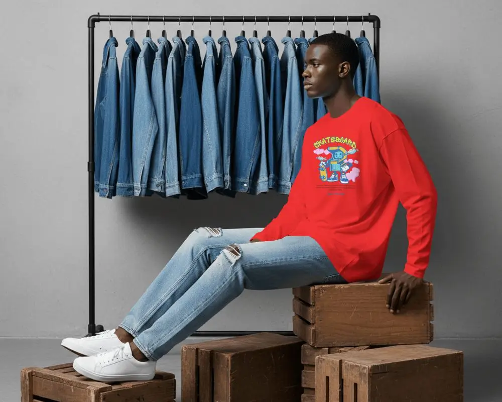 Denim Rack T Shirt Mockup Male Model Seated On Wooden Crates In Modern Studio Setting