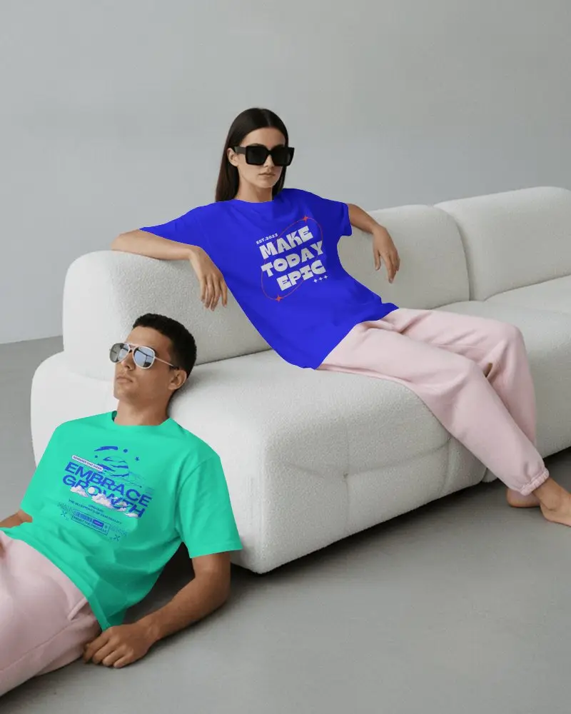 Couple Lifestyle T Shirt Mockup Two Models Wearing Relaxed Tees On White Sofa In Minimal Studio