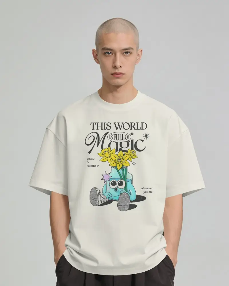 Shaved Head Male Model Wearing Oversized T Shirt Front Facing With Hands In Trouser Pockets