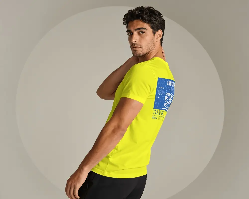 Editorial Male Model T Shirt Mockup With Sculptural Body Angle And Large Circular Studio Backdrop