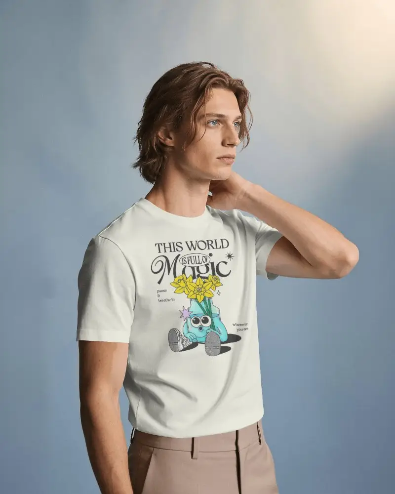 Side Gazing Mens T Shirt Mockup With Medium Length Haired Model Resting Hand Behind Neck