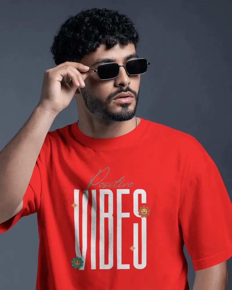 Close Up Mens T Shirt Mockup With Curly Haired Model Adjusting Sunglasses In Dark Editorial Studio