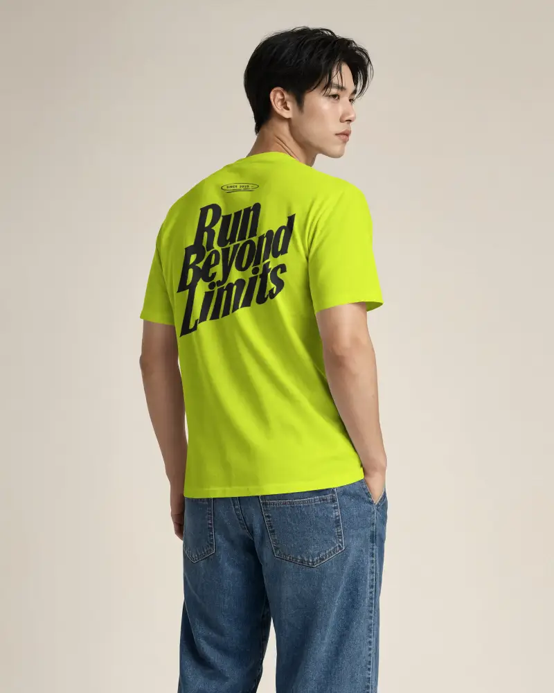 Back View Male T Shirt Mockup Standing In Studio And Looking Over Shoulder