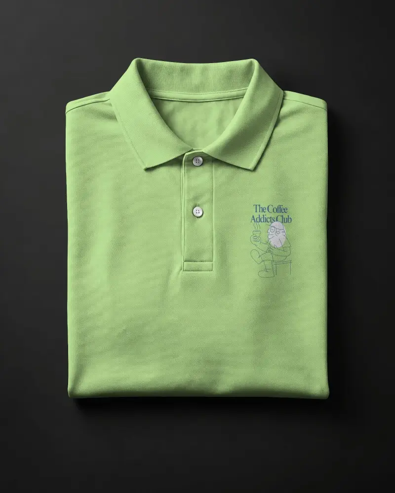 Folded Polo Shirt Mockup Front Facing On Dark Surface With Dramatic Studio Lighting