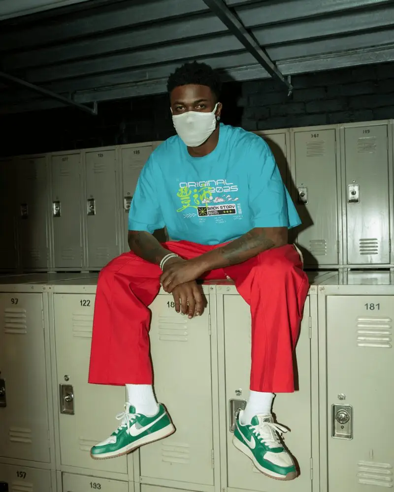 Urban Casual Men Plain Tshirt Mockup With Relaxed Fit In Locker Room Setting