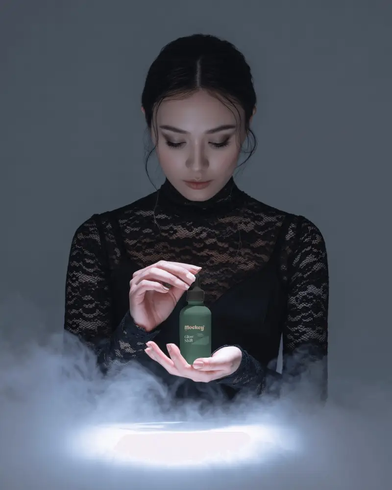 Mystical Dropper Bottle Mockup Female Model In Dark Lace With Soft Glow And Fog