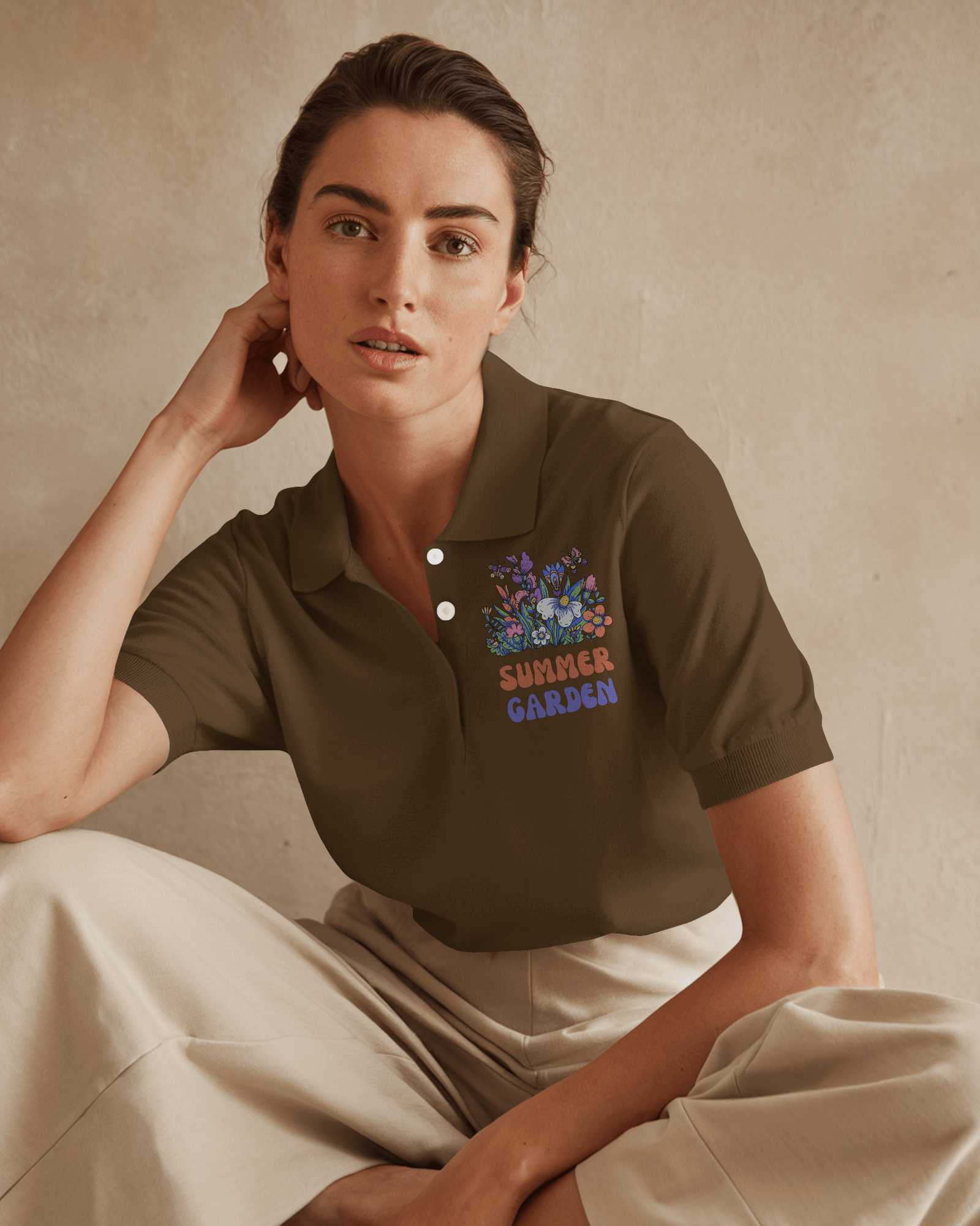 Modern Polo Shirt Mockup Female Model In Deep Teal Polo With Inspirational Design Sitting Against Textured Neutral Background Stylish And Confident Look