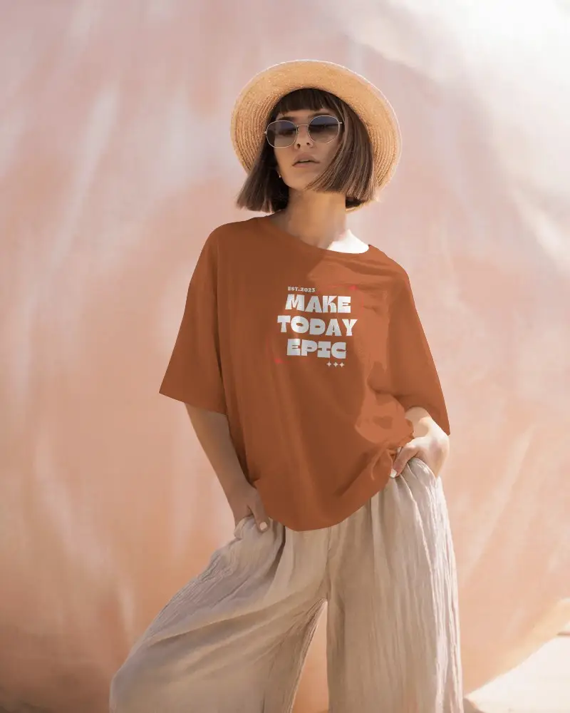 Sunlit Bohemian T Shirt Mockup Female Model In Wide Pants And Hat Relaxed Summer Street Style