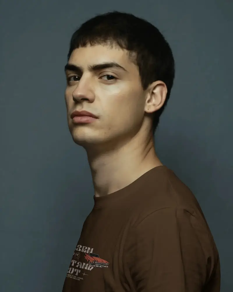 Side Profile T Shirt Mockup With Moody Lighting Modern Studio Style And Bold Expression