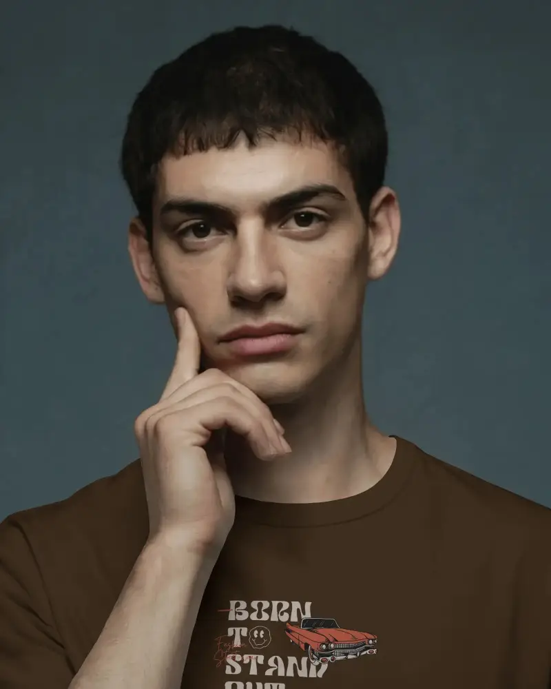 Thoughtful Pose T Shirt Mockup Hand On Face Studio Style Dark Backdrop Modern Minimalist