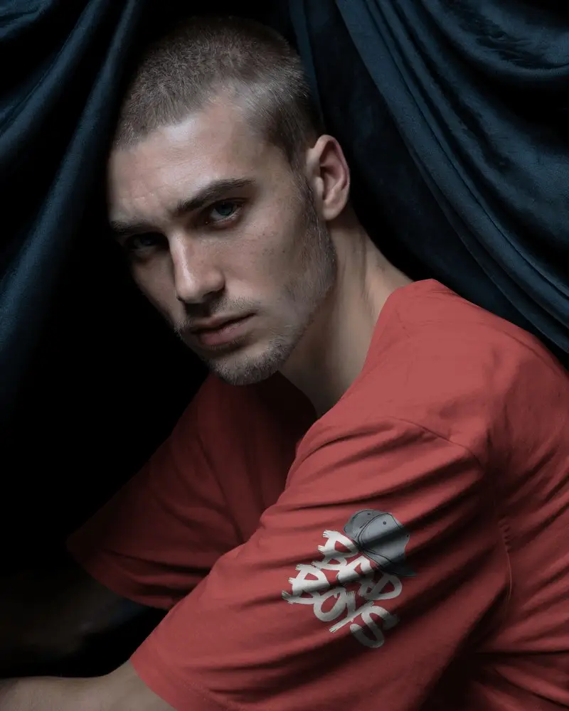 Closeup Of Men Tshirt Mockup In Comfortable Tee Around Dark Drapes Fashionable And Simple Look