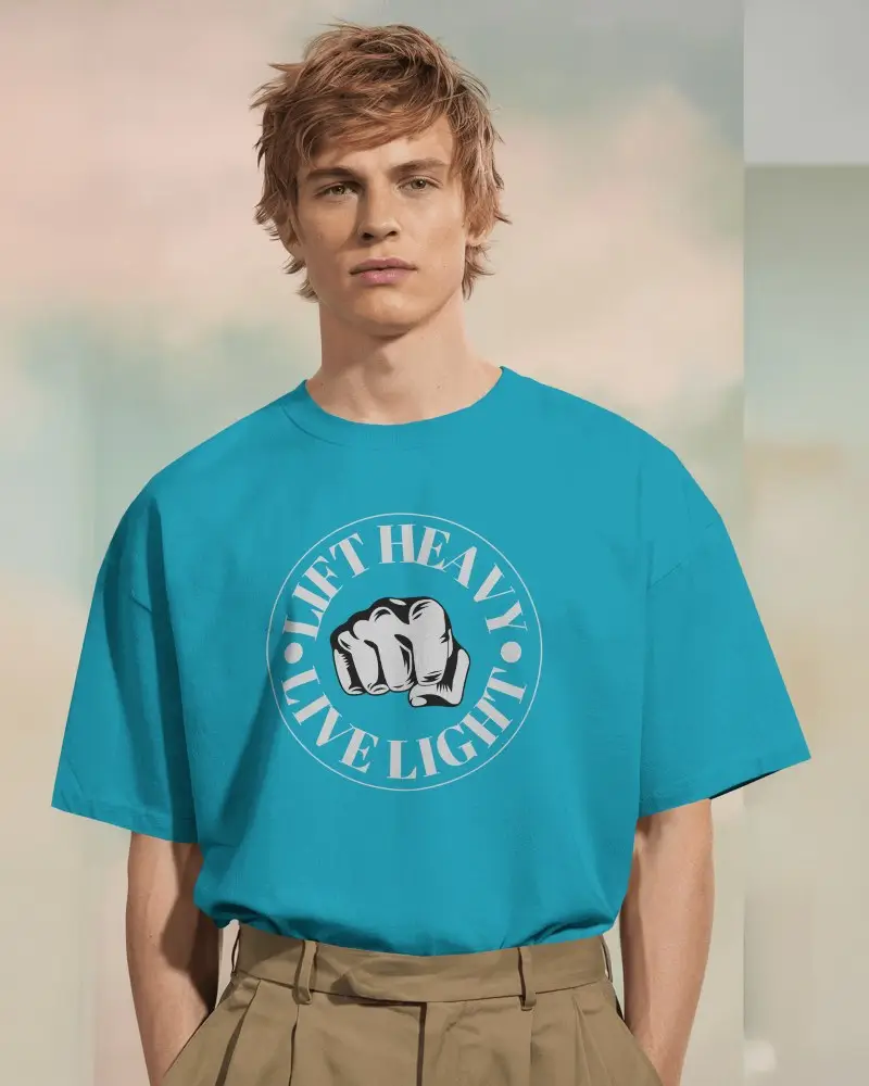 Boxy White Tshirt Mockup Male Model Standing In Soft Pastel Studio Lighting