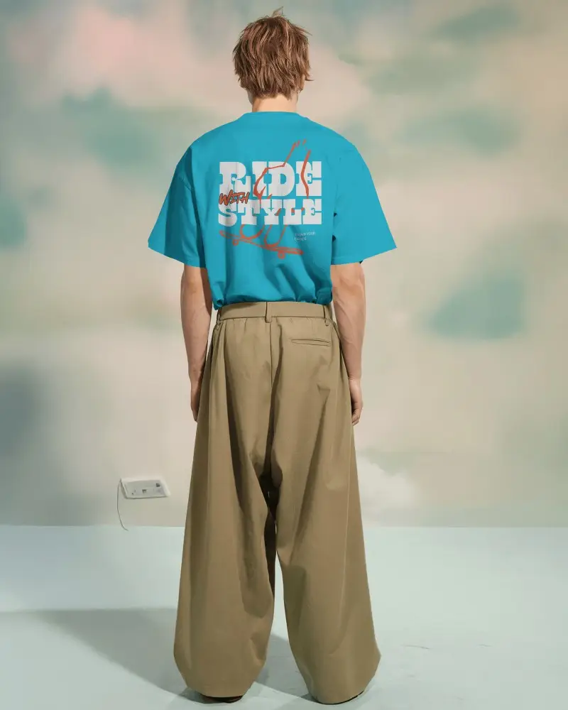 Back View Boxy Tshirt Mockup Male Model In White Tee On Soft Gradient Backdrop