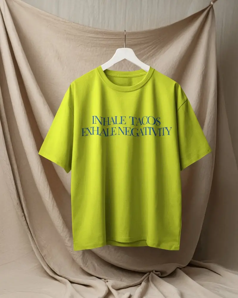 Boxy Blank White Round Neck Unisex T Shirt Mockup On Hanger Draped Fabric Background Soft Studio Lighting Minimal And Versatile Presentation