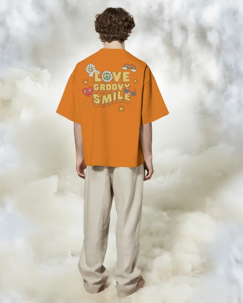 Boxy Blank White Round Neck Unisex T Shirt Mockup Back View On Male Model Cloudy Dreamlike Background Relaxed Pose Soft Light Studio Vibe