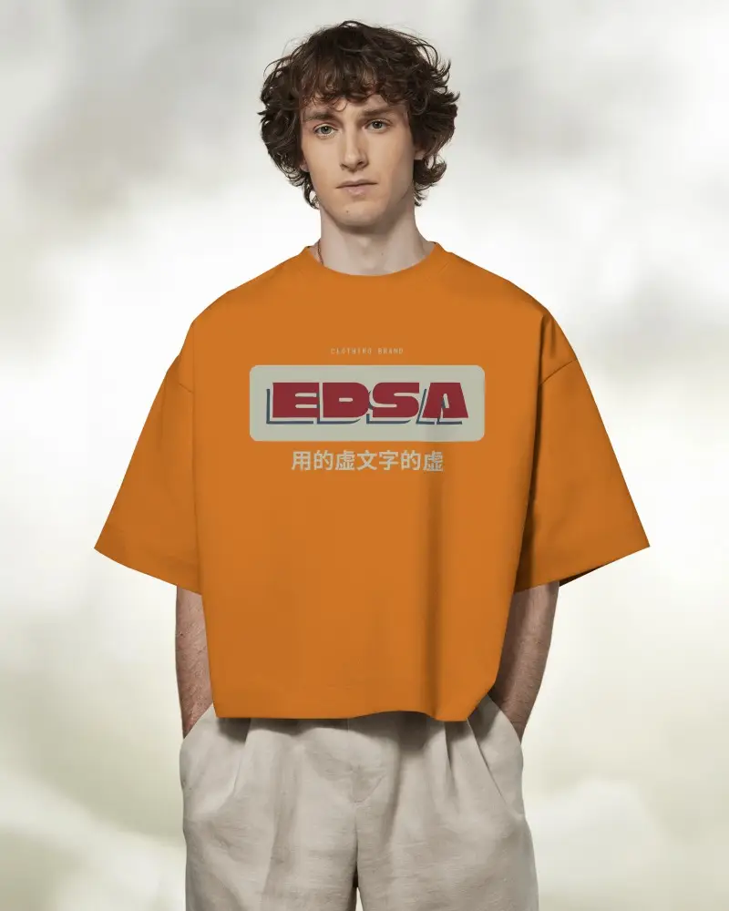 Boxy Blank White Round Neck Unisex T Shirt Mockup Front View On Male Model Soft Cloudy Background Hands In Pockets Casual And Airy Vibe