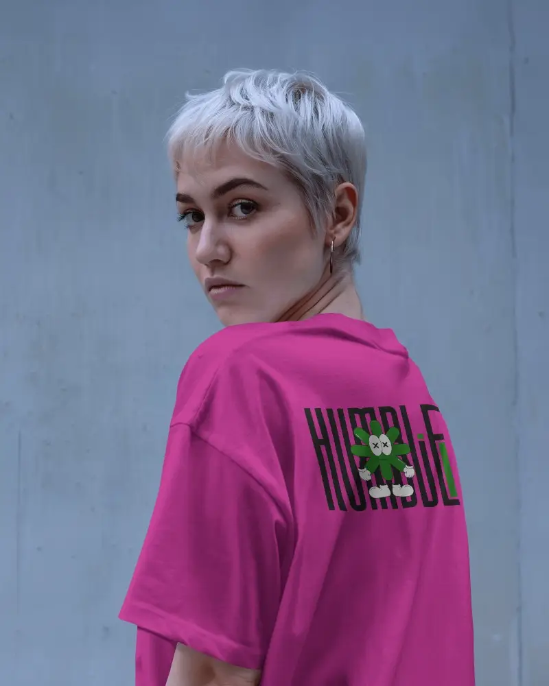 White Back Print Tshirt Mockup Short Haired Female Model Looking Over Shoulder Blue Wall Background Template