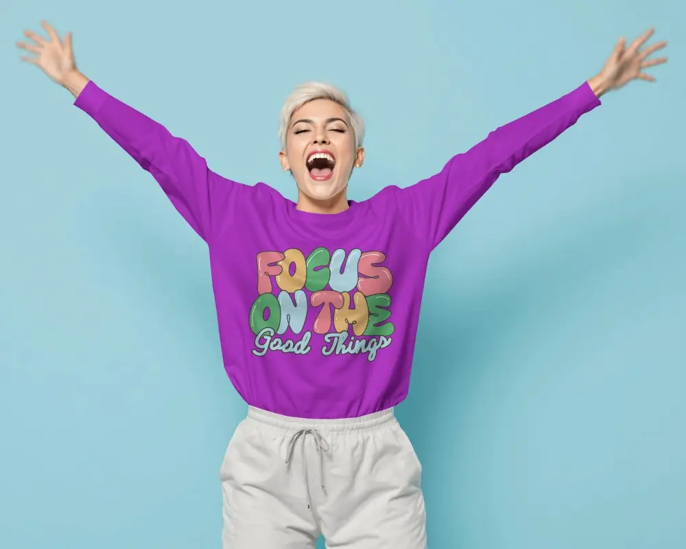 Energetic Female Tshirt Mockup Front View Model Arms Raised On Blue Background