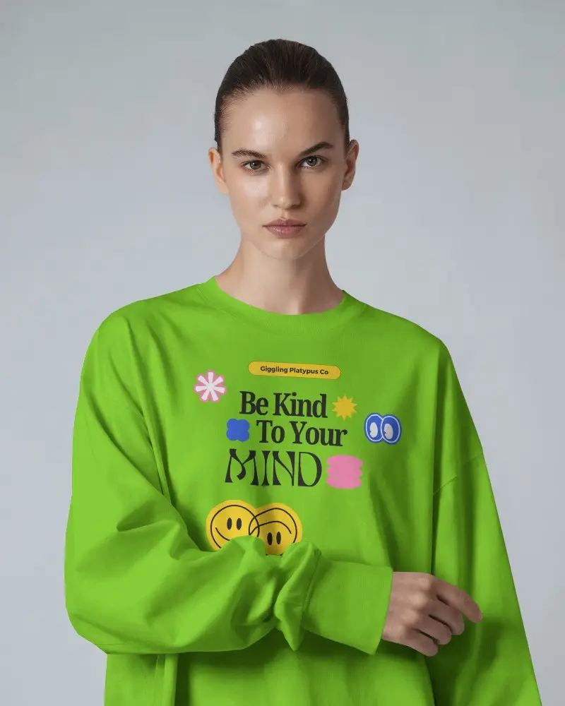 Minimalist Long Sleeve Tshirt Mockup Female Model In White Tee With Serious Expression