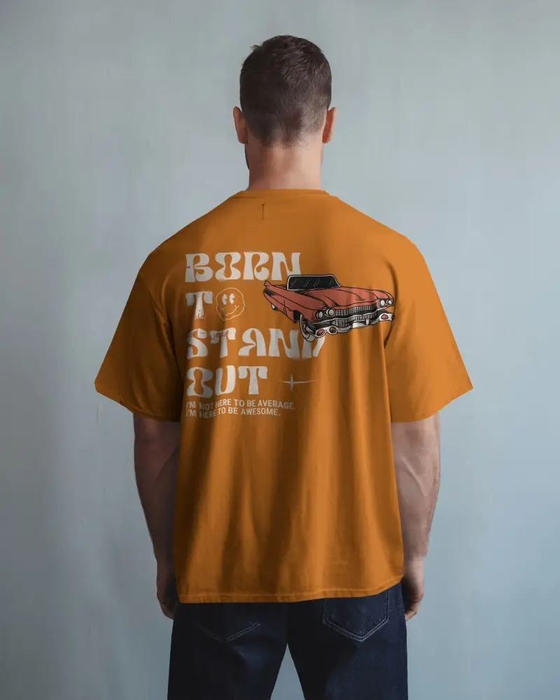 Back View Tshirt Mockup Male Model In White Tee Against Muted Blue Wall