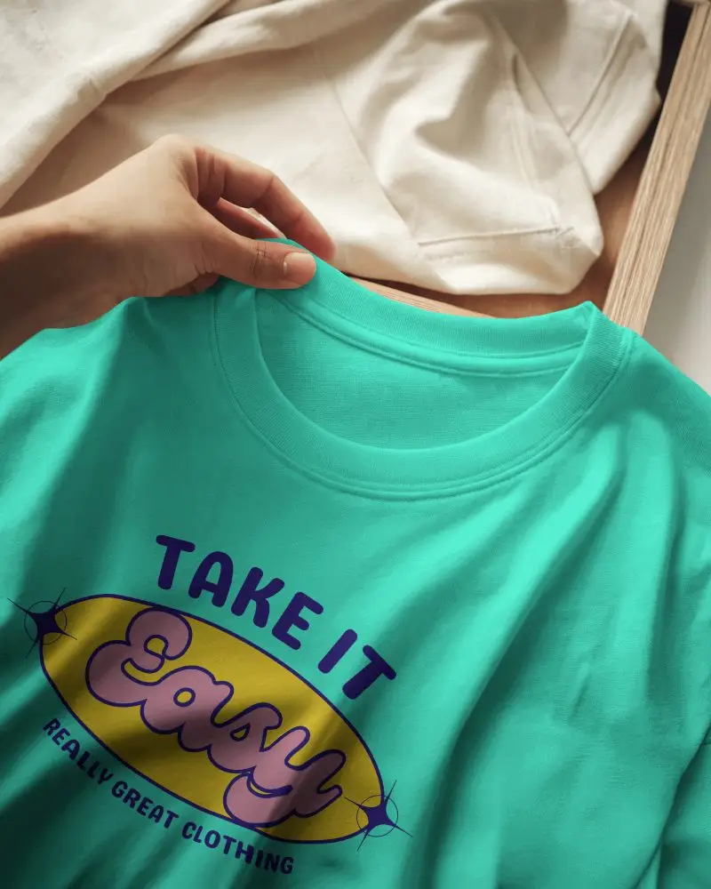 Close Up Tshirt Mockup White Shirt With Hand Detail And Cream Fabric Backdrop