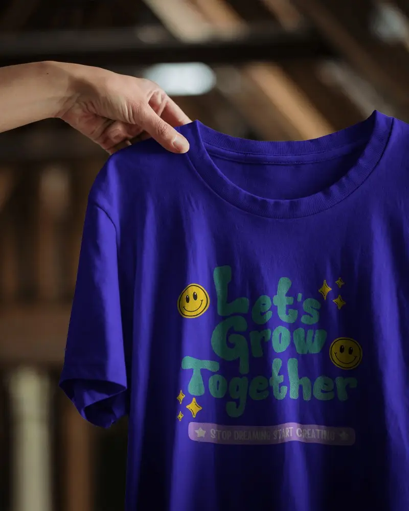 Natural Light Holding Tshirt Mockup Close Up Of Hand Holding Blank Shirt In Wooden Loft With Sunlight Texture Details