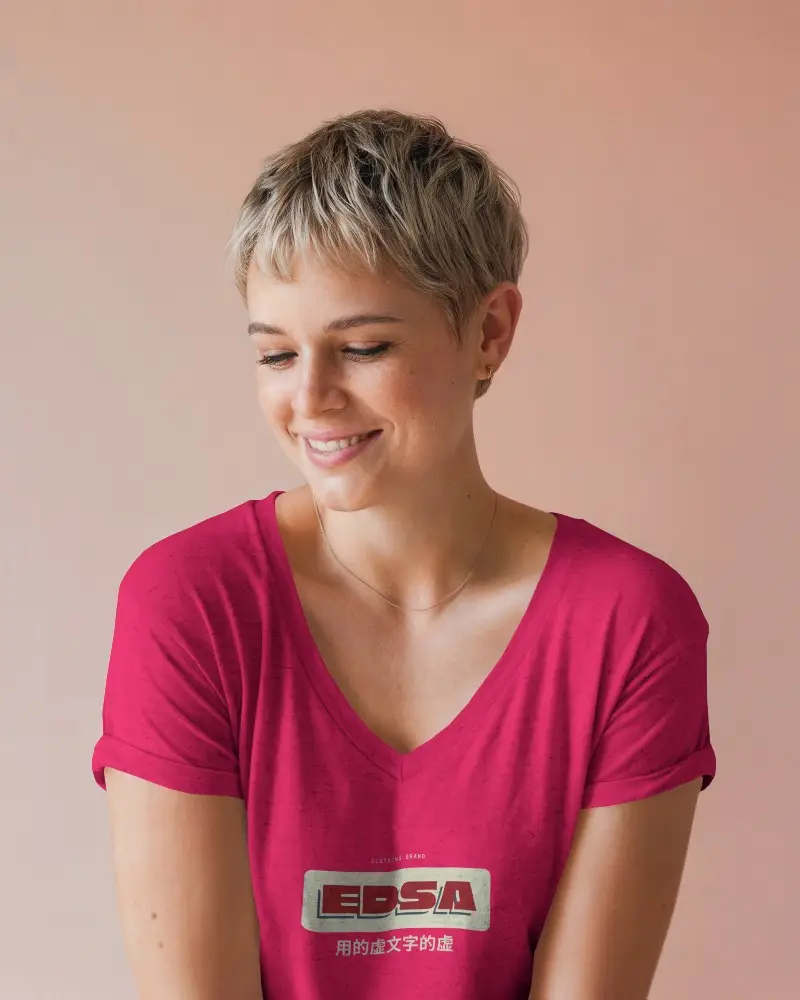 V Neck T Shirt Mockup Female Model Looking Down In Soft Warm Lighting Casual And Peaceful Ambience