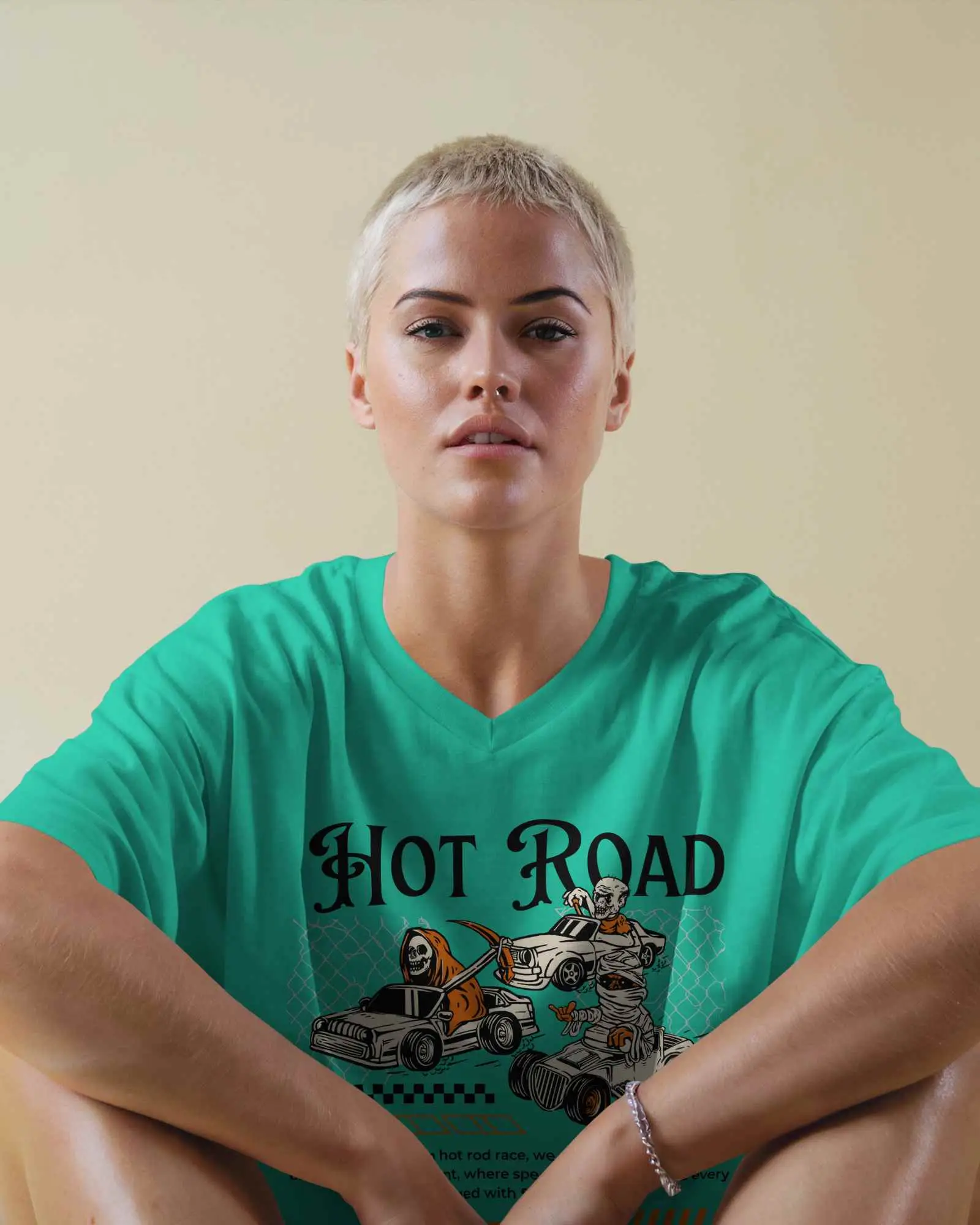 Minimal T Shirt Mockup Female Model In Relaxed White Tee Sitting Against Soft Beige Wall Casual And Confident Look