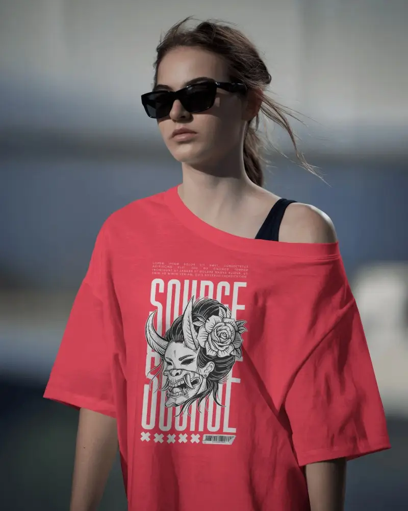 Streetwear Inspired Tshirt Mockup Featuring Model In Relaxed Off Shoulder Tee Under Natural Sunlight