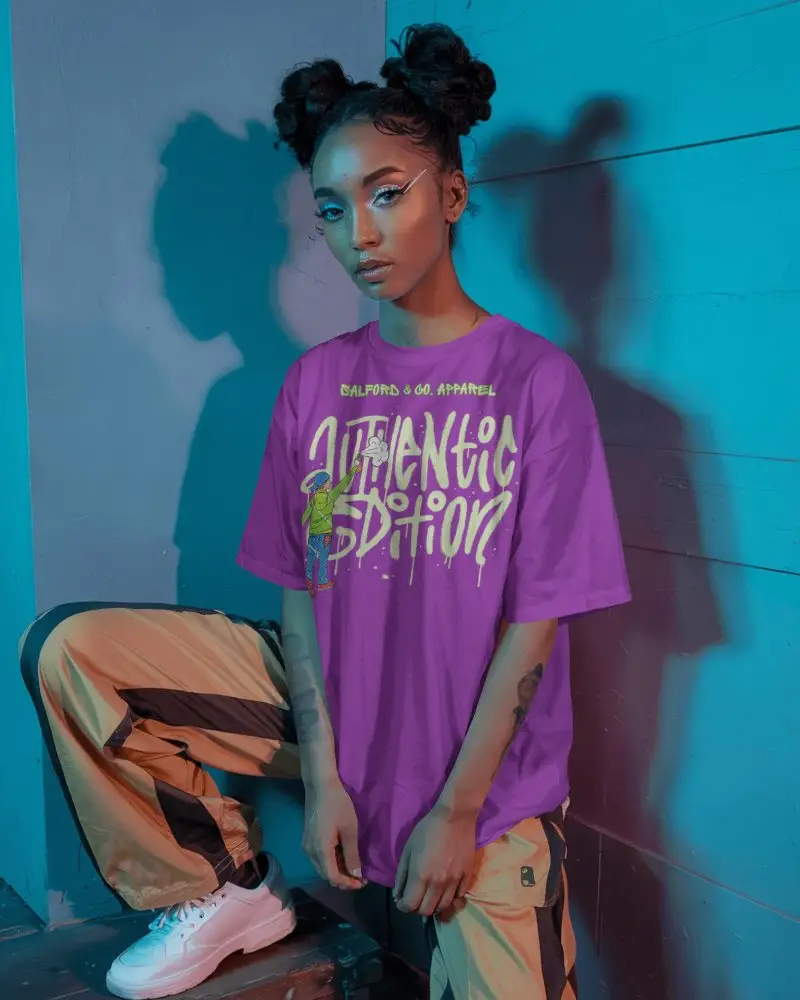 Neon Lit Tshirt Mockup Female Model In Streetwear Pose Under Cyan And Purple Light