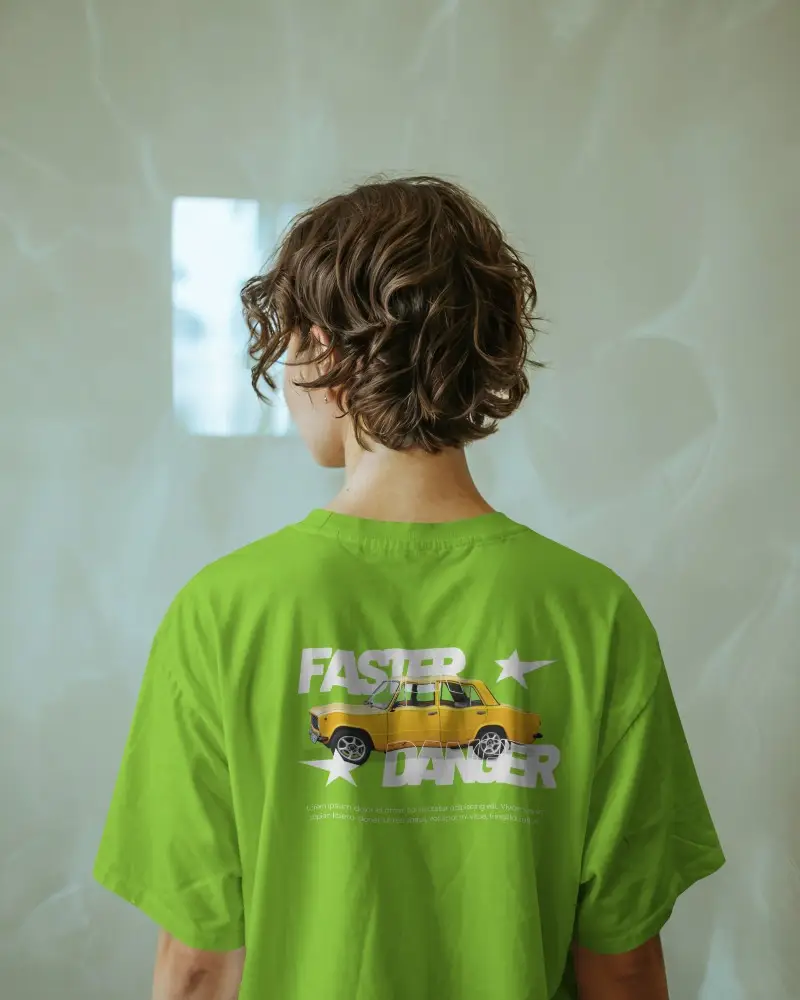 Back View Tshirt Mockup Curly Haired Model In White Shirt With Soft Mint Wall