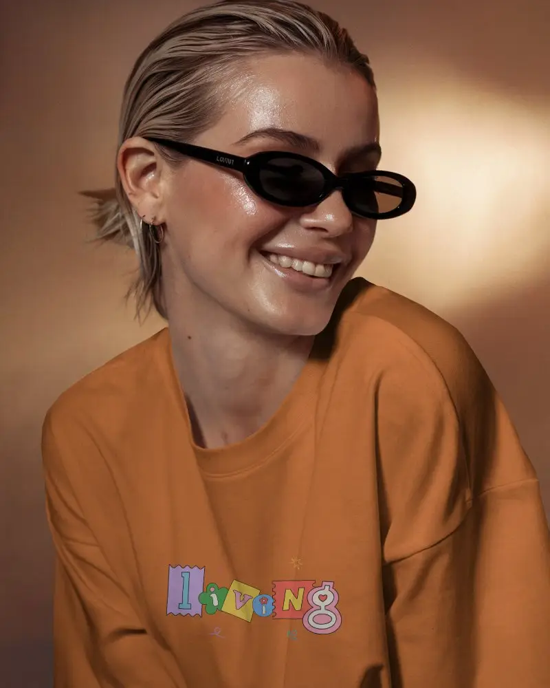 Fashion Forward Long Sleeve Tshirt Mockup Smiling Model In Sunglasses Warm Golden Light