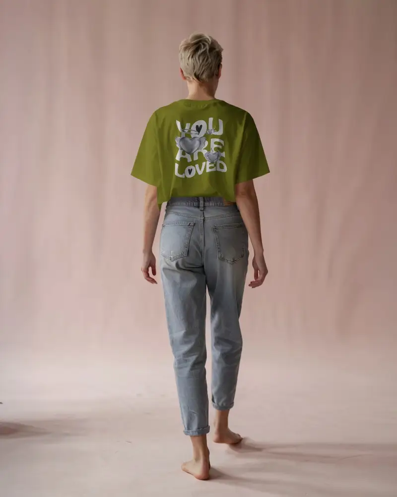 Soft Pink Studio Back Tshirt Mockup Blonde Woman In White Tee And Jeans Walking Away Barefoot In Minimal Setting Soft Lighting And Clean Composition