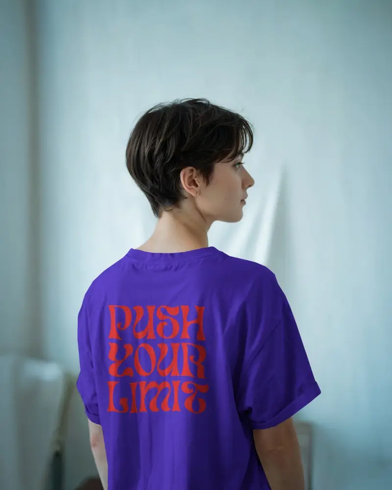 Back View Tshirt Mockup Female Model In Minimalist Room Soft Blue Tones Clean Design Template For Branding And Custom Print Showcase