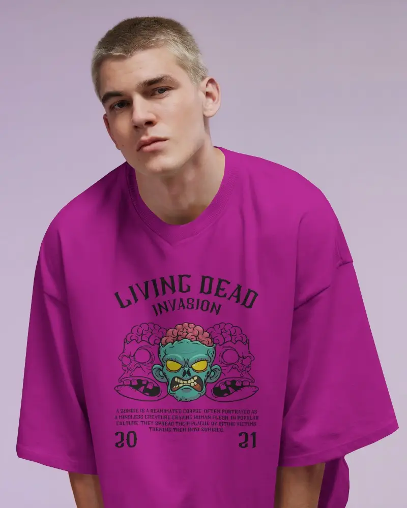 Bold Front Facing Oversized Tee Mockup Male Model In White Shirt Against Purple Studio Background Ideal For Streetwear Or Unisex Designs
