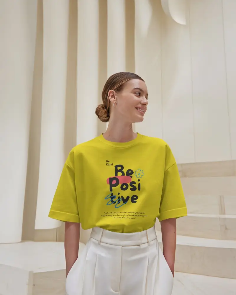 Minimalist Architectural T Shirt Mockup Woman Smiling In Softly Lit Modern Interior Wearing White Tee With Rolled Sleeves High Waist Trousers