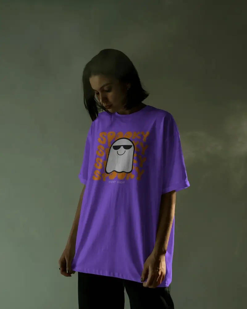 Moody Studio T Shirt Mockup Female Model Looking Down In Soft Smoky Lighting